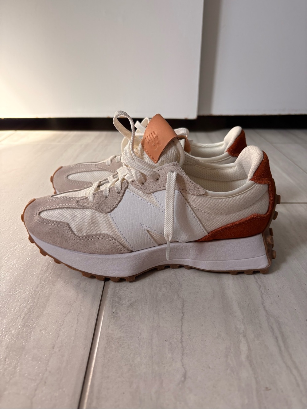 Women’s New Balance 327 sneakers in the Sea Salt and Rust Oxide color way